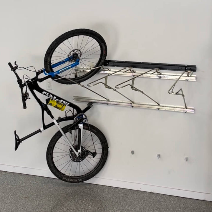 tilt and pivot garage bike rack with on bike 